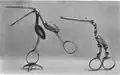 Stork-shaped sugar tongs (Great Britain, 18th century). When opened, the bodies of the birds reveal a baby inside, illustrating the legend of the stork delivering babies