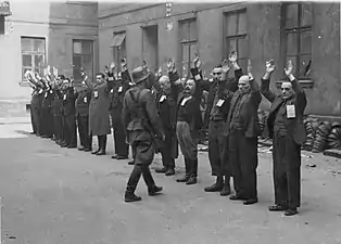 NARA copy #4, IPN copy #4The Jewish department heads of the armament firm BrauerHerman Brauer helm repair shop at Nalewki 28-38