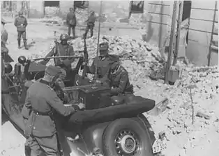 IPN copy #41The radio car of the command postStroop near command car, probably at Zamenhofa 48 near intersection with Miła.