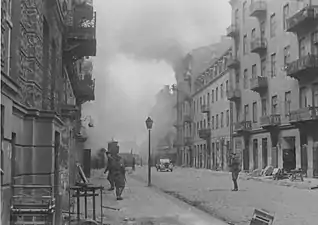 IPN copy #45(No image caption, in section This is how the former Ghetto looks after having been destroyed)Nowolipie Street looking West towards the gate at Nowolipie / Smocza intersection.