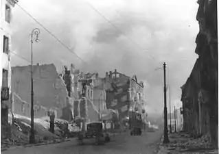 NARA copy #47, IPN copy #50(No image caption, in section This is how the former Ghetto looks after having been destroyed)Nalewki Street, looking South from the gate at Nalewki/Gęsia/Franciszkańska intersection.