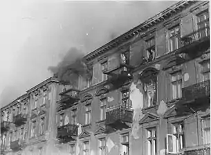 NARA copy #39Bandits jump to escape captureMen preparing to commit suicide by jumping off the upper floors of 23 and 25 Niska Street. 22 April 1943