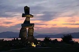 Sunset on the inuksuk at English Bay