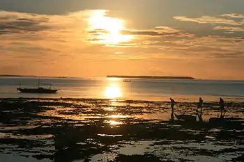 View looking west, sunset behind Hilotongan