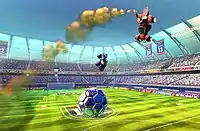 Airborne cars above a football pitch attempting to hit a ball situated beneath them