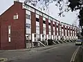 The 20th century version of the crescent terrace. Falconhurst in The Crescent, Surbiton, at the heart of Pooley's development.