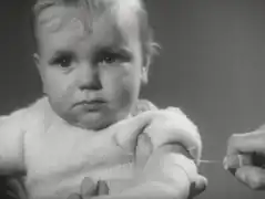 Infant receiving smallpox vaccine