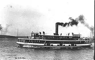 A new Kamiri in her original varnished timber with white trim livery, likely 1912 her launch year.