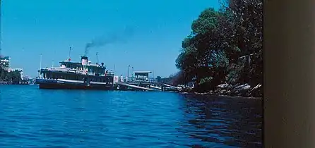 The timber wharf in 1982 before its 1985 replacement with a concrete structure