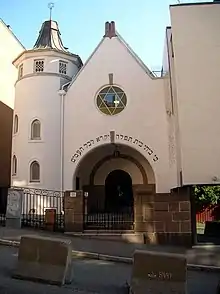 Exterior of the synagogue in Oslo, note concrete barriers