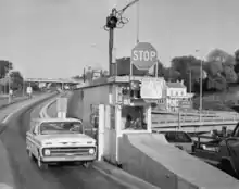 A car stopped a toll booth