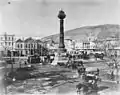 Hejaz Railway - Damascus square and pillar. The gabled building is the Hejaz Railway Line office.