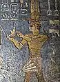 Taharqa making dedications to Egyptian Gods, in the Temple of Mut, Jebel Barkal, Sudan. His name appears in the second cartouche: 𓇿𓉔𓃭𓈎 (tꜣ-h-rw-k, "Taharqa").