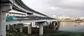 Taipei Bridge seen from Sanchong in 2008The lower bridge is the eastbound motorcycle/bicycle/pedestrian bridge and the upper one is an entrance ramp from Huánhé Road (環河南路)