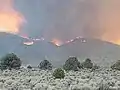 The fire burning just west of Highway 395 on July 21.