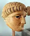 Another fragmentary terracotta head