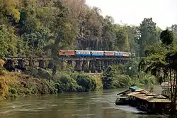 A train running through the "Hell Rail Pass"