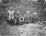 British soldiers with a mortar captured during the Battle of the Somme