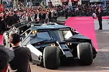 A photograph of the Batman's vehicle, the Tumbler, among a crowd at the European premiere of The Dark Knight in London