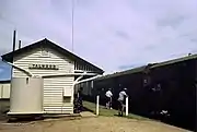 The Dirranbandi Mail arrives at Talwood railway station, 1987