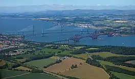 A view of the firth with three metal bridges across it