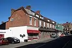 George Hotel, Anderson and Sons Butchers, Lemon Blue Gift Shop, Oliver Fisher Estate Agents, The Cornerhouse Flat.