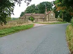 Lodge and Gateway with Screen Walls to North East of Rounton Grange