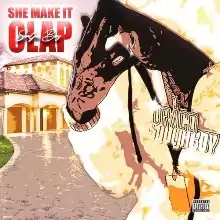 A man in a cream colored jacket is pointing to his forehead with his right hand; he is positioned in front of a stylized photo of a mansion and driveway, wearing two chains which read "Draco" and "SouljaBoy. The words "She Make it Clap" are to the left in red text, while "Soulja Boy" is in cursive.