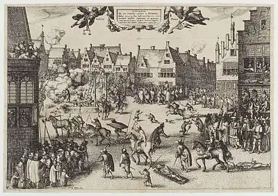 A busy urban scene. Medieval buildings surround an open space, in which several men are being dragged by horses. One man hangs from a scaffold. A corpse is being hacked into pieces. Another man is feeding a large cauldron with a dismembered leg.  Thousands of people line the streets and look from windows.  Children and dogs run freely.  Soldiers keep them back.