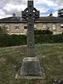 The grave of George Finch in the churchyard of Holy Cross Church, Burley