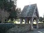 Lychgate and churchyard wall to St Mary's Church