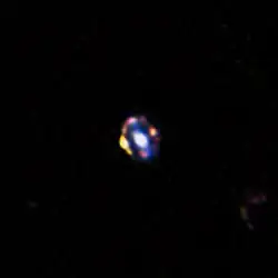 Gravitational lens discovered at redshift z = 1.53.