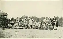 The 1st Massachusetts Heavy Artillery Regiment bury dead Confederates at the Alsop Farm May 19, 1864