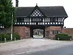 Gatehouse to Thornton Manor and Attached Courtyard Walls