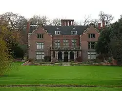 Thrumpton Hall and attached range of outbuildings