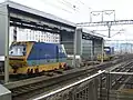 Track maintenance vehicles stabled along sidings outside Kyoto station