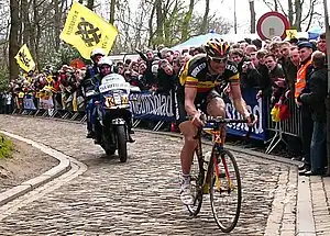 Tom Boonen climbing the Muur van Geraardsbergen