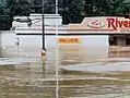 Tom's Riverside, a grocery store at 632 Broad Street, in New Bethlehem, PA, in July 1996 during the flooding.