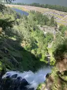 Top of Multnomah Falls with lodge and parking lot visible, along with I-84 and the Columbia River)