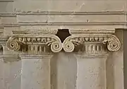 Ionic capitals of the fireplace of the Tornié hotel.