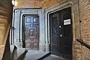 Doors on the first floor of the stair tower of the Hôtel du Vieux-Raisin (between 1515 and 1528).