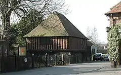 The Town Hall and The Crane House, with the stocks outside the Town Hall