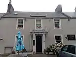 Main Street, Plough Hotel Including Outbuildings And Boundary Walls