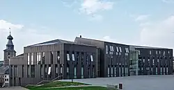 Town hall with belfry in the background