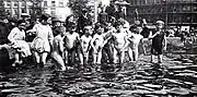 Trafalgar Square, c. 1912 boys and girls swimming