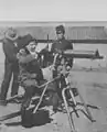 A foreign instructor demonstrating a Maxim machine gun to a Korean soldier. Acquired from Great Britain in (Unknown).