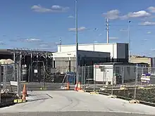 Tunnel portal buildings surrounded by fences