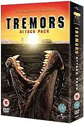 Image of a DVD box titled "Tremors Attack Pack" with am image of one of the monsters of the cover