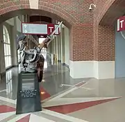 Alternate entrance with Trojan statue