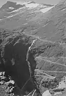 Valley head or trough end at Isterdalen from a different angle showing Trollstigen road and waterfall